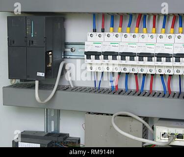 Image shows control cubicle. Electric device and circuit breakers inside power case Stock Photo