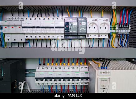 Image shows control cubicle. Electric device and circuit breakers inside power case Stock Photo