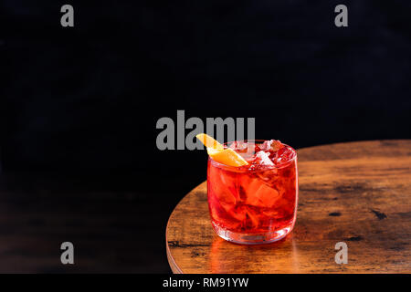 Refreshing Gin Negroni Cocktail on a Table Stock Photo