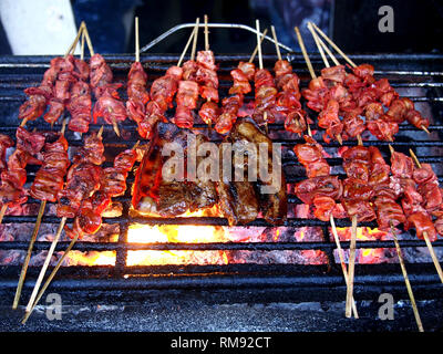Photo of assorted pork barbecue being grilled Stock Photo