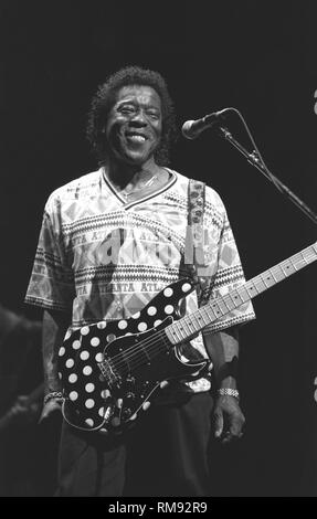 Singer, songwriter and guitarist Buddy Guy is shown performing on stage during a 'live' concert appearance. Stock Photo