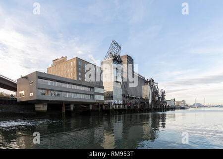 Old industrial building in the Dutch city of Rotterdam. Factory construction at an old haven port. Stock Photo