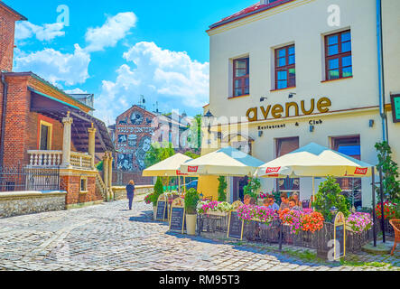 KRAKOW, POLAND - JUNE 21, 2018: Historical Jewish Kazimierz neighborhood is one of the most interesting places in Krakow with numerous cozy restaurant Stock Photo