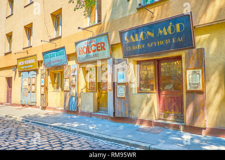 KRAKOW, POLAND - JUNE 21, 2018: The line of preserved historical store's facades are the remains of former Jewish trading life of Kazimierz district,  Stock Photo