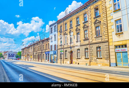 KRAKOW, POLAND - JUNE 21, 2018: The large Boleslaw Limanowski Street with historical edifices on the sides is the main thoroughfare in Podgorze distri Stock Photo