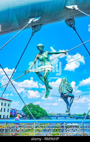 KRAKOW, POLAND - JUNE 21, 2018: Details of metal construction of modern Father Bernatek bridge across the Vistula river, decorated with acrobatic grav Stock Photo