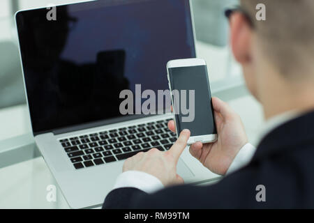 engeneer business man with thin modern aluminium laptop in network server room Stock Photo