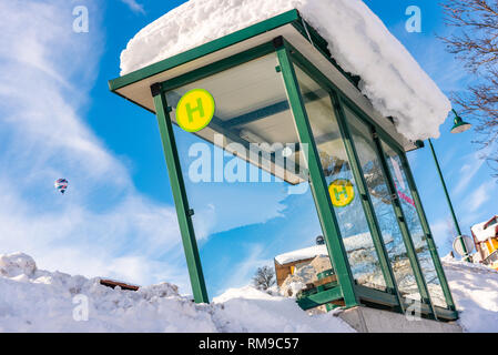 Austrian bus stop, sign ski region Schladming-Dachstein, Dachstein massif, Liezen District, Styria, Austria, Europe Stock Photo