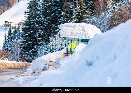 Austrian bus stop, sign ski region Schladming-Dachstein, Dachstein massif, Liezen District, Styria, Austria, Europe Stock Photo