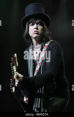 Cinderella singer and guitarist Tom Keifer is shown performing on stage during a 'live' concert appearance. Stock Photo