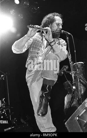 Musician Ian Anderson is shown performing on stage during a 'live' concert appearance with Jethro Tull. Stock Photo