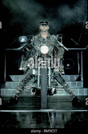 Singer Rob Halford of the English heavy metal band Judas Priest is shown performing on stage during a 'live' concert appearance. Stock Photo