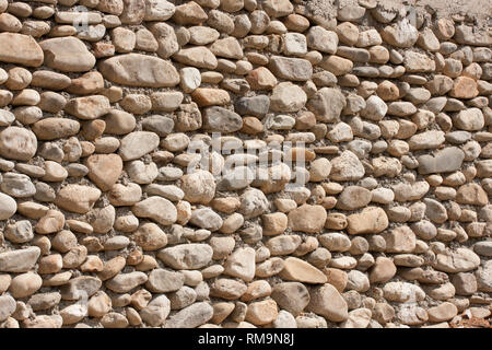 Foundation wall of cement and stone Stock Photo