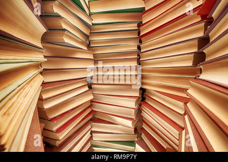 Large books pile. Wide angle view selective focus on front Stock Photo