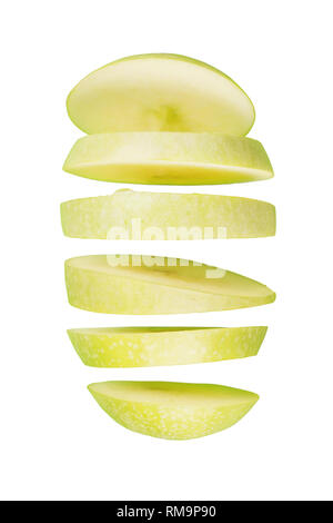 Sliced green apple flying. Isolated on white Stock Photo