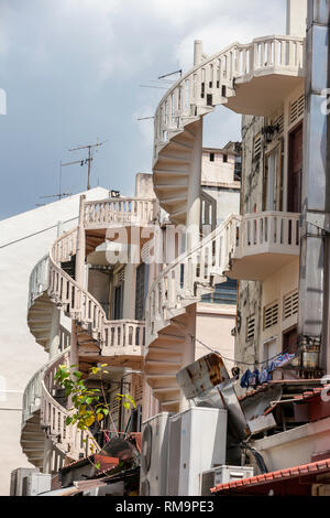 Singapore  Joo Chiat District, Circular Exterior Stairways on Middle-class Houses. Stock Photo