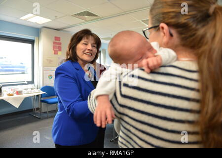 Kilmarnock, UK. 14th Feb, 2019. Transforming maternity and neonatal care across Scotland Cabinet Secretary for Health Jeane Freemanl visits Crosshouse Hospital in NHS Ayrshire and Arran to announce a £12 million investment which will ensure mums, babies and other family members are all supported from pregnancy to birth and after. This includes testing a new model for neonatal care for babies needing the most specialist treatment. Credit: Colin Fisher/Alamy Live News Stock Photo