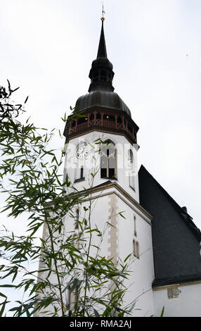 31 January 2019, Saxony, Markranstädt: Panoramic view of the 60 m high church tower and part of the roof truss of the St. Laurentius church in Markranstädt, where an antique cabinet, an antiquarian bookshop and a small museum for visitors have been set up. Members of the Förderverein zur Erhaltung der Kirche have collected discarded books, household objects, toys, records and pictures from residents. For 15 years they have been collecting donations for the renovation of the late Gothic hall church. Visitors can donate here to acquire the objects, most of which are decades old, and thus contrib Stock Photo