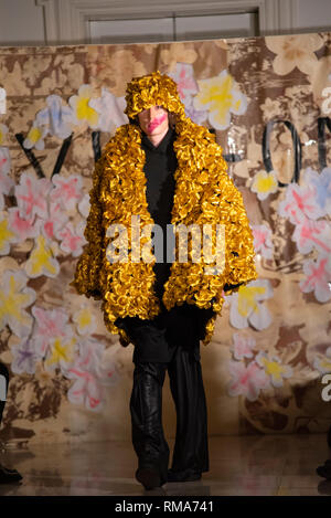 Vin + Omi, in collaboration with Ocean, presented their latest collection in the 1901 Restaurant, Andaz London, ahead of London Fashion Week. The eco designer duo create their sometimes outlandish outfits from recycled materials Stock Photo