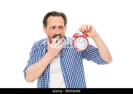 Figure out why you are always late. Man bearded mature guy hold alarm clock. Time management skill. Take control of time. Self discipline concept. How to avoid being late. Being late is habit. Stock Photo