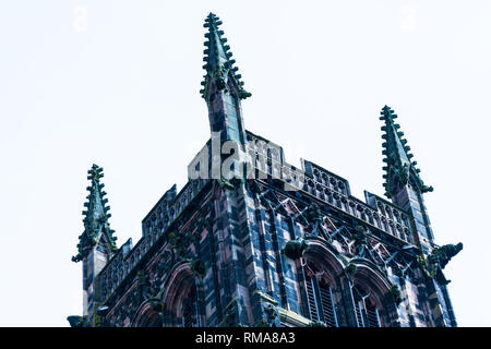 BIRMINGHAM, UK - March 2018 Angle View of St. Peters Collegiate Church in Bluish Camouflage Effect. Railings Intricate Carvings and Sculpture of Minia Stock Photo