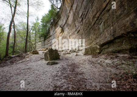 Looking up at the impressive St. Peter Sandstone cliffs in St. Louis Canyon of Starved Rock State Park Illinois. Stock Photo