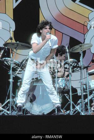 Singer Michael Hutchence of the Australian rock band INXS is shown performing on stage at the US Festival in San Bernadino, California. Stock Photo