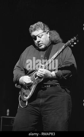 Guitarist Rich Williams of the progressive rock band Kansas is shown performing on stage during a 'live' concert appearance. Stock Photo