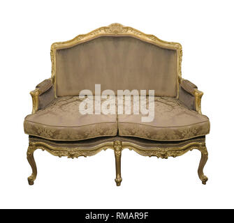 Old vintage sofa with golden wood details isolated on white background with clipping path Stock Photo