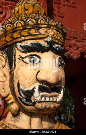 Cambodia, Kampot Province, Kampot, Trey Koh, Fish Island, Wat Traeuy Kaoh, folk art, face of frightening demonic figure Stock Photo
