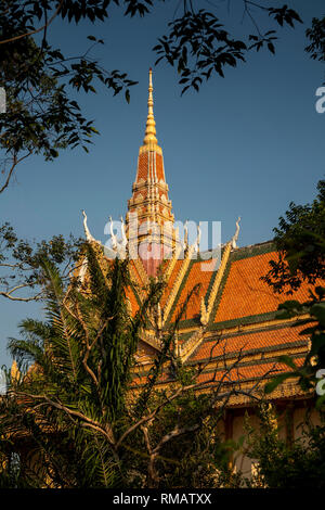 Cambodia, Kampot Province, Kampot, Trey Koh, Fish Island, Wat Traeuy Kaoh, ornate tiled roof of prayer hall Stock Photo