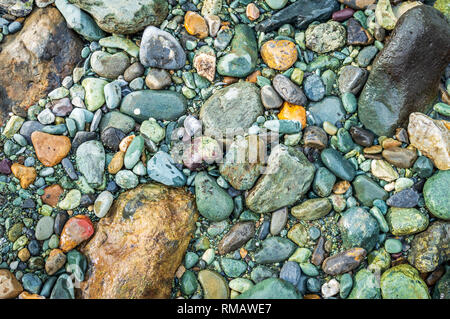 A coarse surface. Groung covered with pebbles. Rough terrain Stock Photo