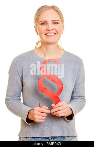 Smiling senior woman is holding a red paragraph as a justice symbol in the hands Stock Photo