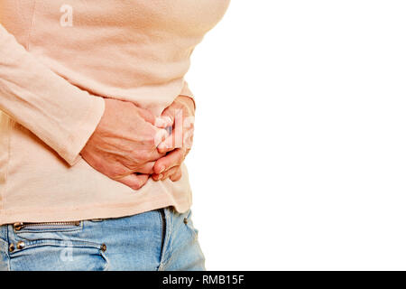 Elderly woman with stomachache keeps her hands in front of her stomach Stock Photo