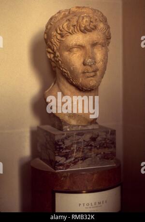 Antique marble bust of the scholar Ptolemy (Ptolemaeus), circa AD 140, who lived in the Egyptian Alexandria. Ptolemy was the most famous geographer and mathematician of antiquity and founder of the so-called Ptolemaic or geocentric model in which the earth is the center of the planetary system. The bust is in the Louvre in Paris. Stock Photo