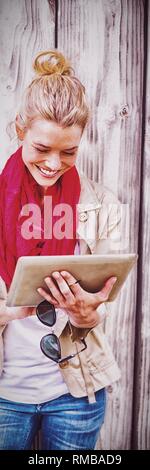 Young woman using digital tablet Stock Photo