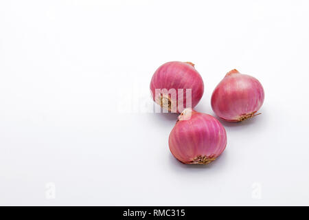 Three Red Onions Isolated on White Background Stock Photo