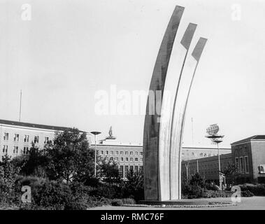 Monument to the Berlin Airlift on the 'Platz der Luftbruecke' in front of the Tempelhof Airport in Berlin. Stock Photo