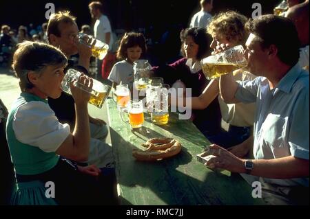 The beer garden at the Chinese Tower in the Englischer Garten with guests drinking beer. Stock Photo