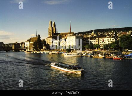 View from the bridge over Limmat and Grossmuenster, undated. Stock Photo