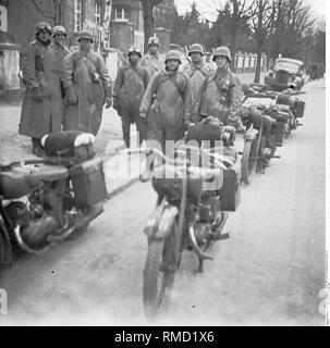 Dispatch riders of the 61st Infantry Division in Kradmantel on his motorcycle on the march in the direction of Heydekrug (Silute) in Memel (Klaipeda) before the start of the Russian campaign. Stock Photo