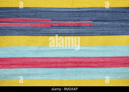 Cloth textured knitted colorful horizontal stripes as background front view Stock Photo