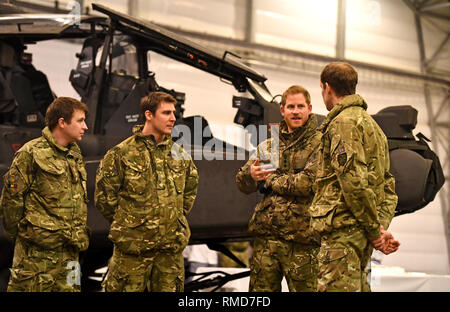 The Duke of Sussex (2nd right) talks to service personnel during a visit to Exercise Clockwork in Bardufoss, Norway, for a celebration of the 50th anniversary of the Commando Helicopter Force and Joint Helicopter Command deploying for extreme cold weather training. Stock Photo