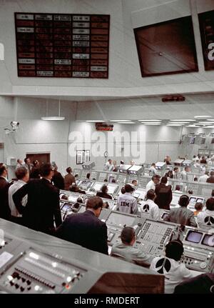 The ground crew in Control Room 2 at Kennedy Space Center at the takeoff of Apollo 14. Apollo 14 was the third Moon landing mission of NASA, the main objective of which was to conduct scientific research of the lunar surface by means of various experiments. Stock Photo