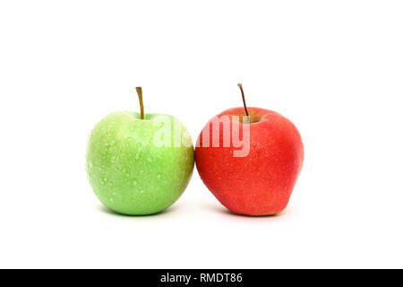 A pair of fresh washed apples, one green and one red, touching. Isolated on white background Stock Photo