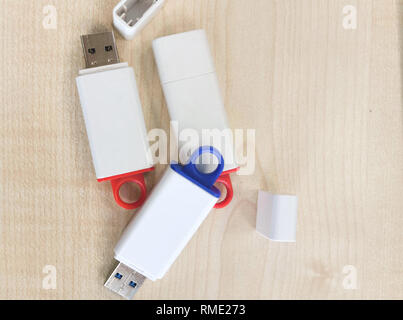 USB stick with wooden background Stock Photo