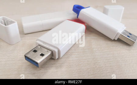 USB stick with wooden background Stock Photo