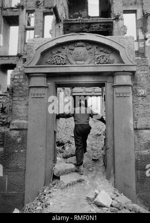 The entrance area of a villa destroyed during the Second World War serves as the entrance to a cellar labyrinth, camouflaged by the rubble of the house. Stock Photo