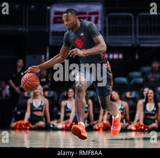 Coral Gables, Florida, USA. 13th Feb, 2019. Clemson Tigers forward Aamir Simms (25) moves the ball against the Miami Hurricanes during the first half of an NCAA men's basketball game at the Watsco Center in Coral Gables, Florida. Mario Houben/CSM/Alamy Live News Stock Photo