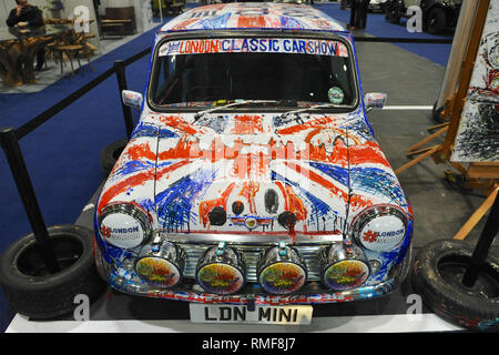 ExCel London, UK. 14th Feb 2019. A custom painted Mini on display at the London Classic Car Show which is taking place at ExCel London, United Kingdom. Around 700 of the world's finest classic cars are on display at the show ranging from vintage pre-war tourers to a modern concept cars. The show brings in around 37,000 visitors, ranging from serious petrol heads to people who just love beautiful and classic vehicles. Credit: Michael Preston/Alamy Live News Stock Photo